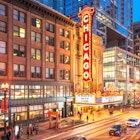 CHICAGO, ILLINOIS - MAY 10, 2018: The landmark Chicago Theatre on State Street at twilight. The historic theater dates from 1921. ; Shutterstock ID 2136945747; purchase_order:65050; job:65050; client:Hottest tickets in Chicago; other:Gemma Graham
2136945747